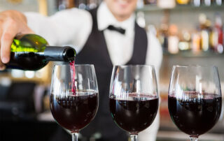 Use a wine glass polishing machine for spot-free glassware.